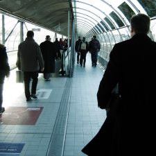 Glass Tunnel Winter Travelers