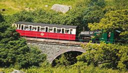 Snowdon Mountain Railway train passing over viaduct